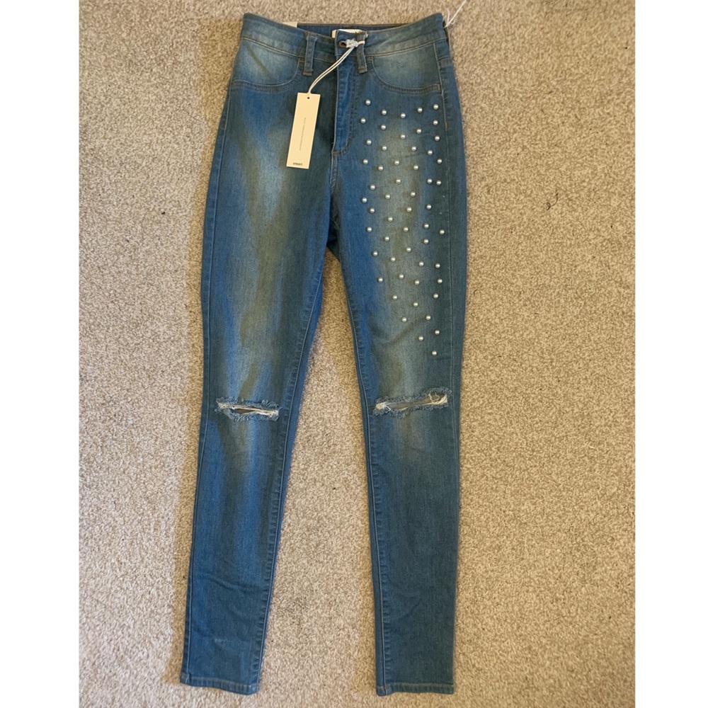 Stylish pair of Jeans with pearl